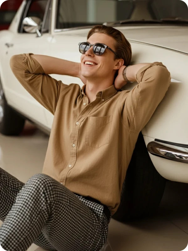 Vintage Car Chill: Checkered Pants & Smile