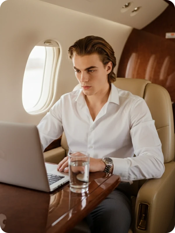 Elegant Man Working on Private Jet
